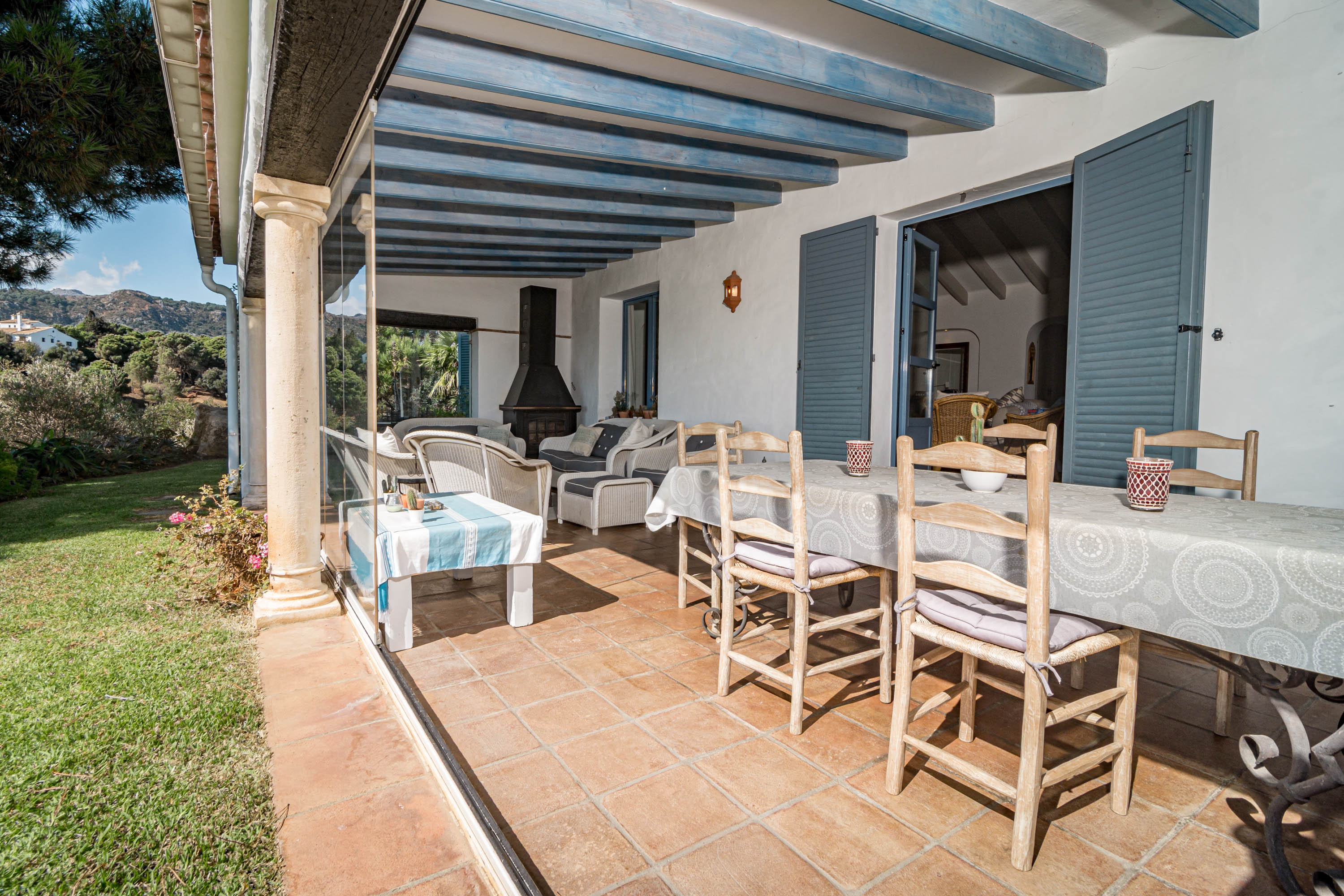 Porch/conservatory opening to pool area and gardens